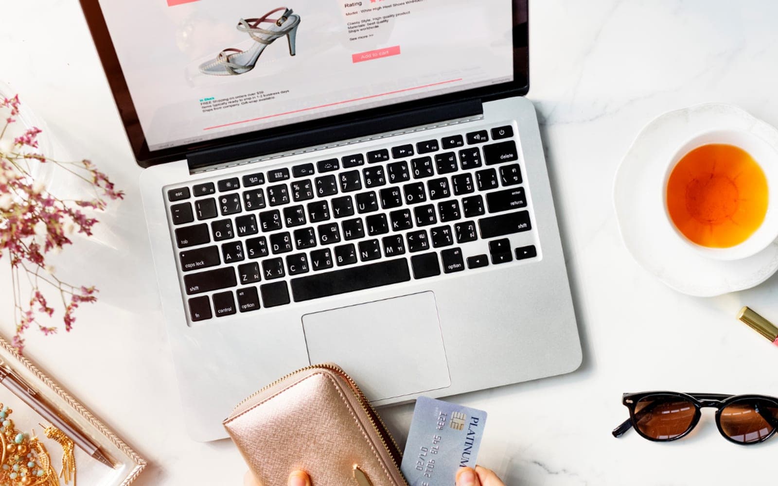 A shopper paying by card during an online purchase at home